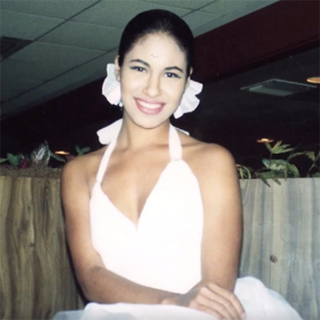 Selena in a white dress
